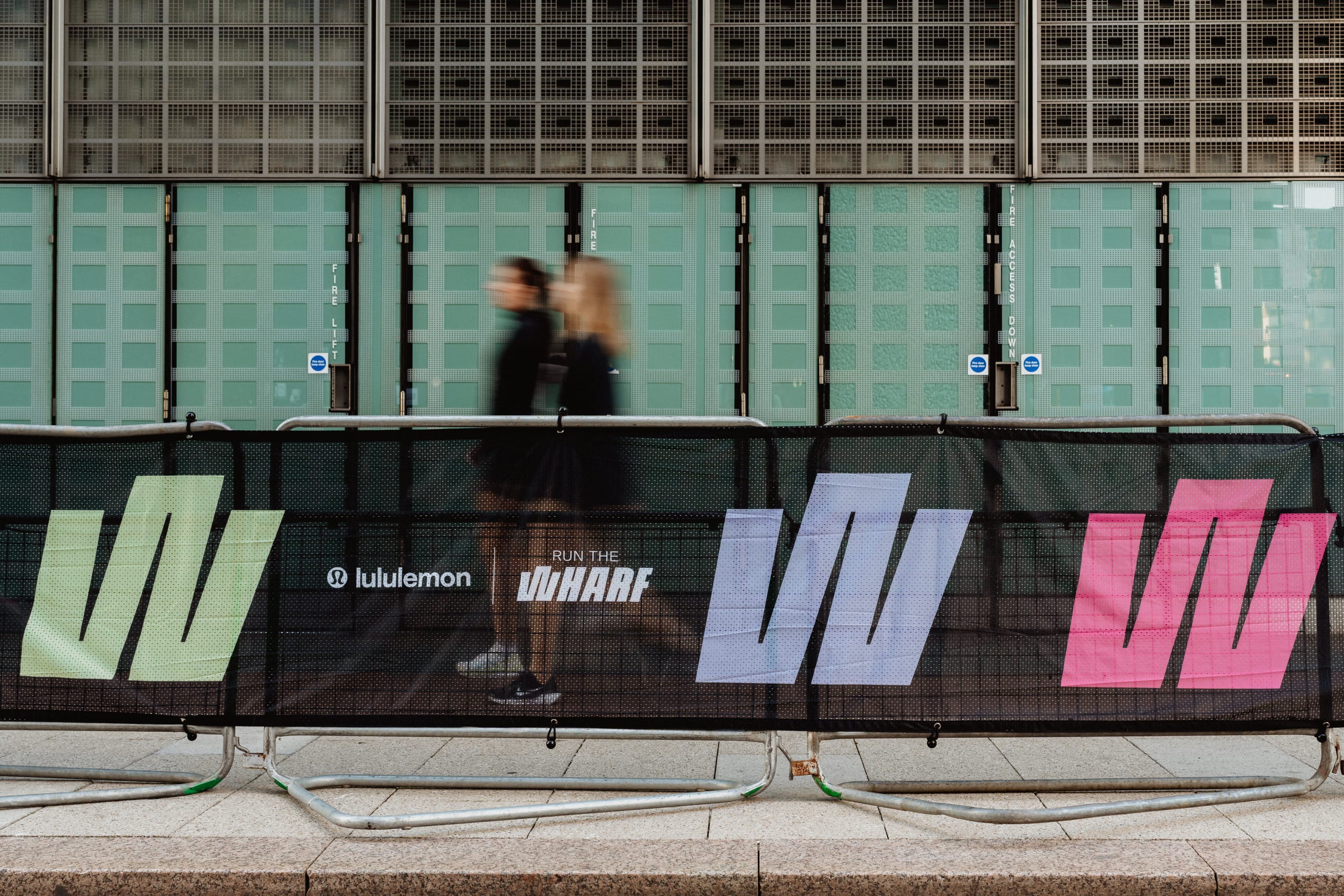 Lululemon Run the Wharf event barriers and branded scrim